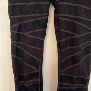 Black Lululemon sheet mesh snake print leggings